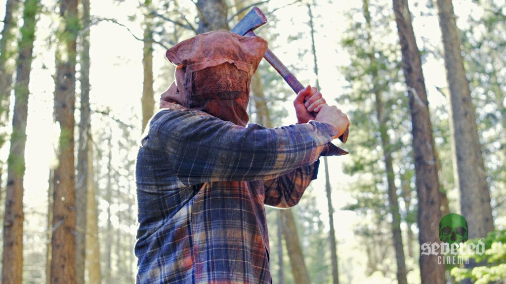 Screenshot of the killer in A Man in the Woods with an Axe