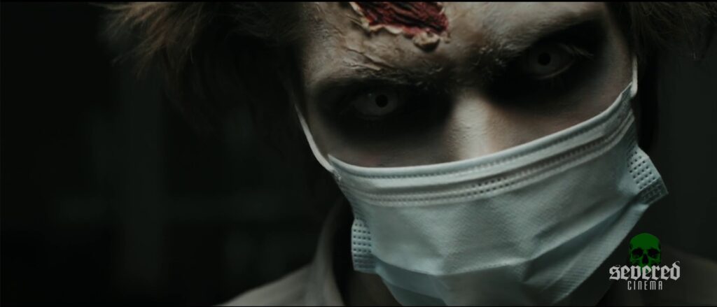 Demonic face wearing a face mask in Michael Moutsatos' movie Chameleon.