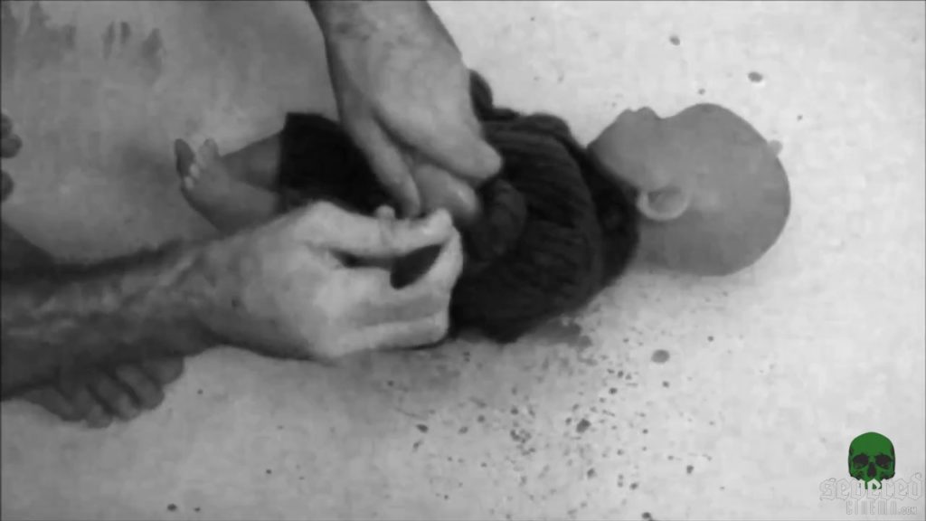Screenshot from the movie Dead Baby Mutilation