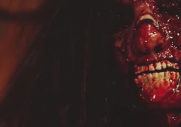 Scene from Dead Inferno of a gory face