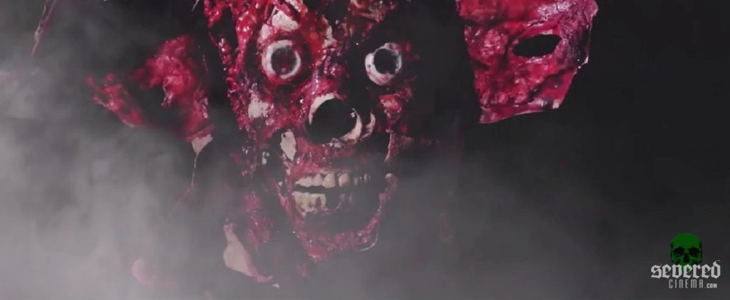 Scene from Dead Inferno of a skull face