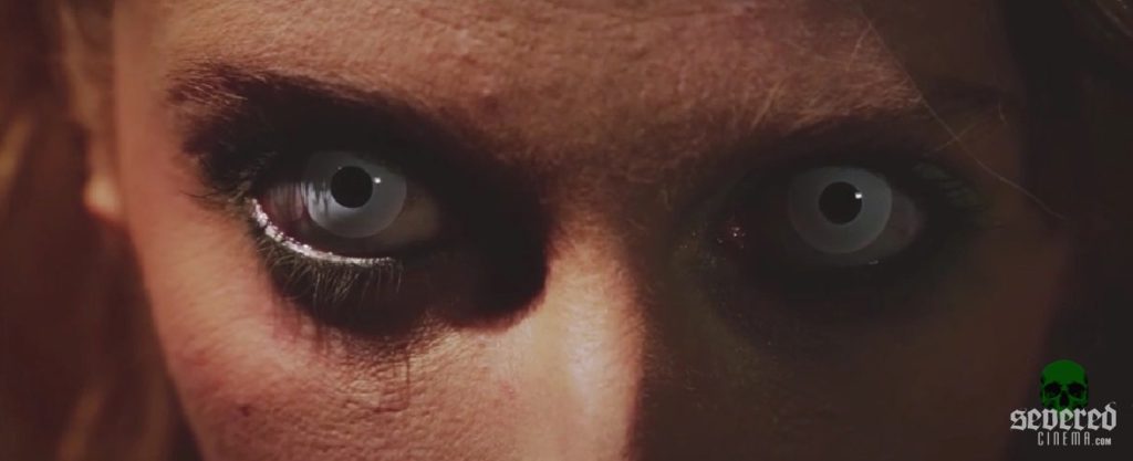 Scene from Dead Inferno of a closeup of female eyes