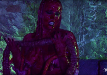 Topless chick holding intestines in Dreaming Purple Neon