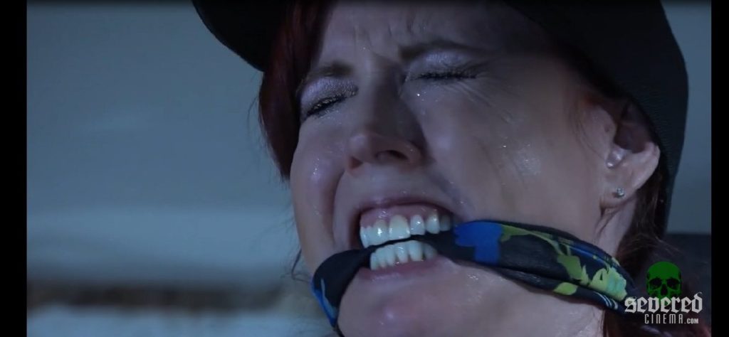 Woman bound and gagged in the movie Final Caller