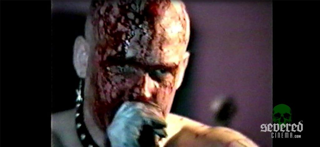 GG Allin covered in blood on stage