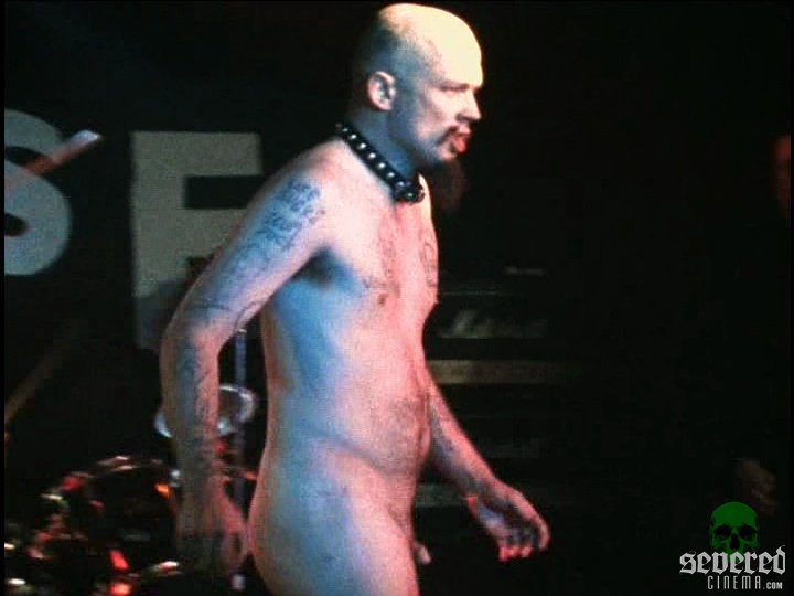 Naked GG Allin on stage.