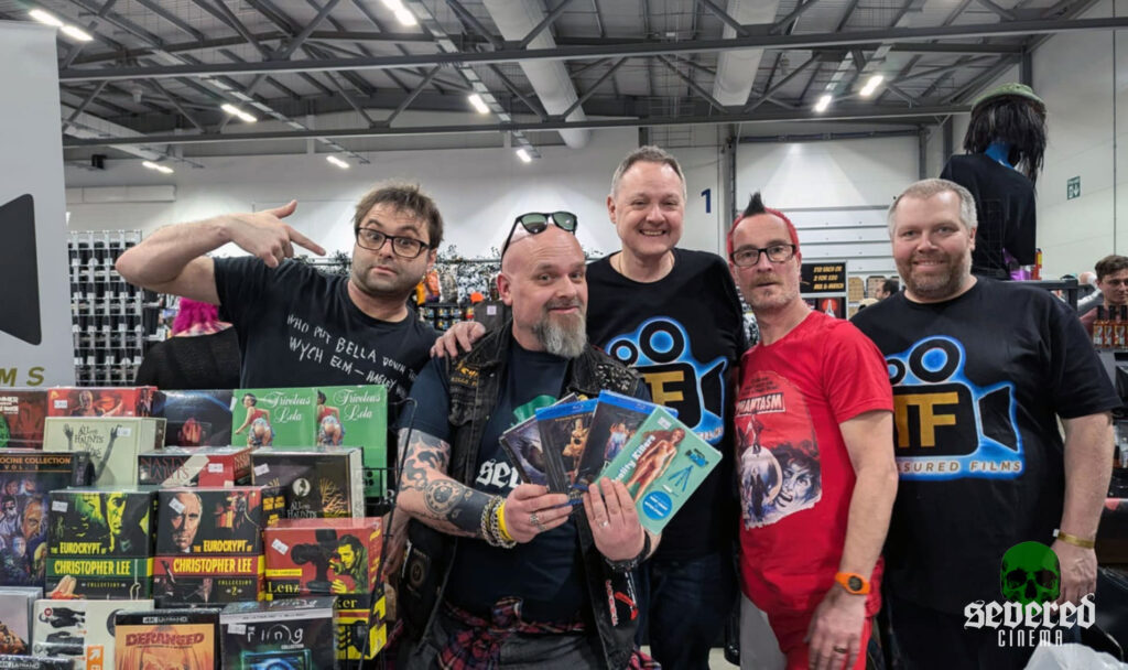 Photo of Jay Creepy with Treasured Films crew at a horror movie convention.