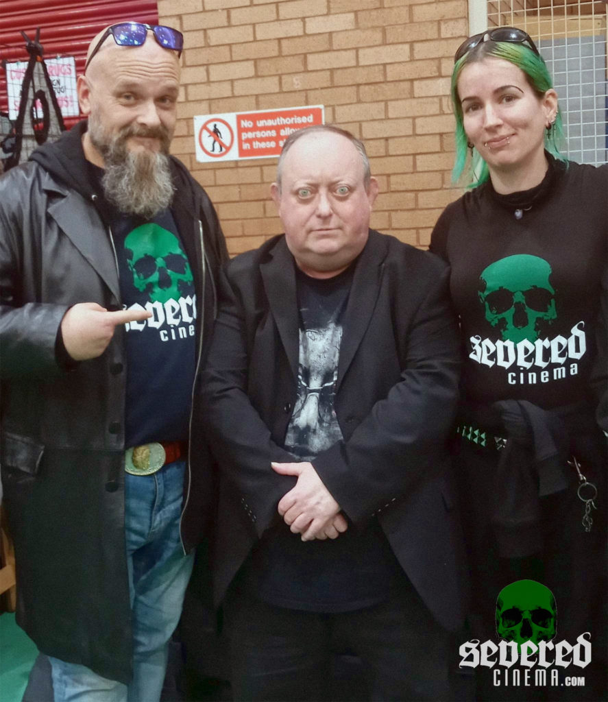 Severed Cinema's Jay Creepy and Willow Brian with Laurence R. Harvey photograph.
