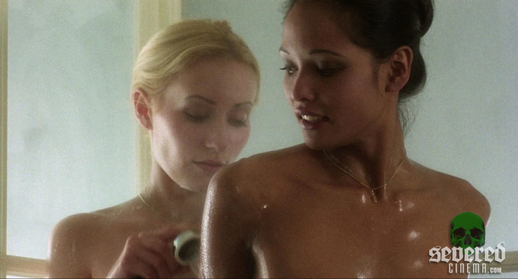 Laura Gemser showering with a bond woman