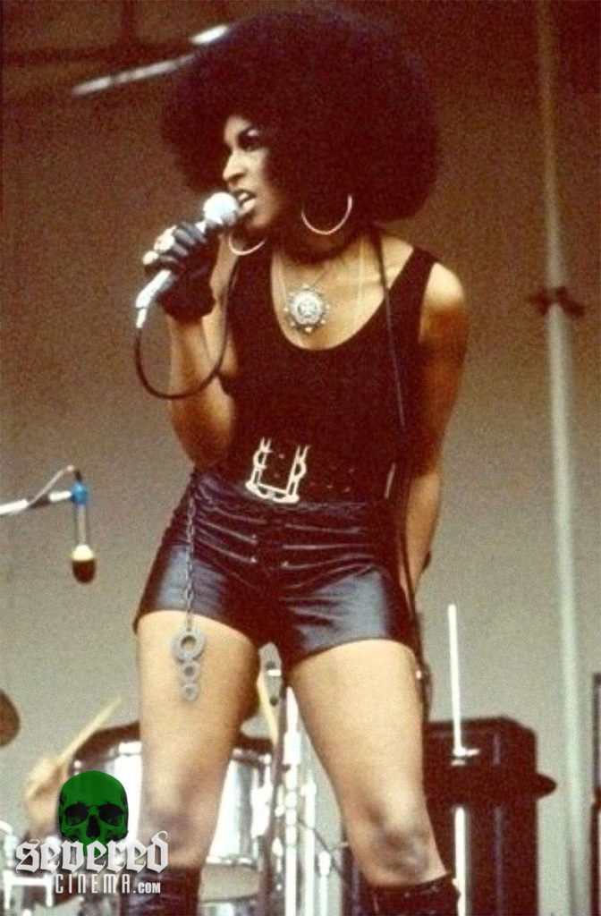 Marsha Hunt rocking out on stage