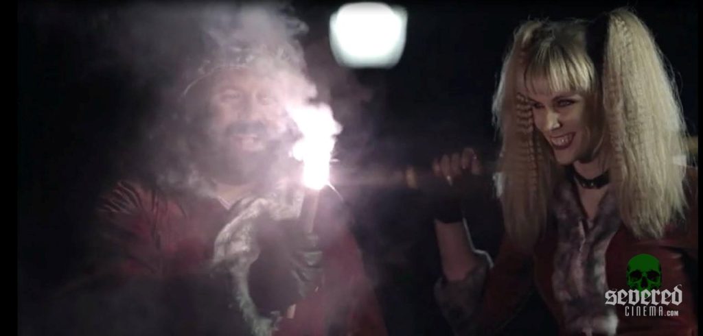 Santa lighting a flair in Once Upon a Time at Christmas