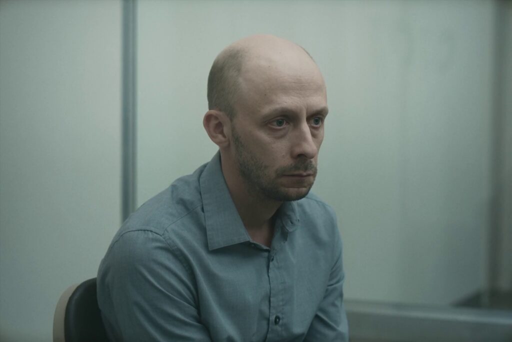 Screenshot from the movie Red Rooms (2023)