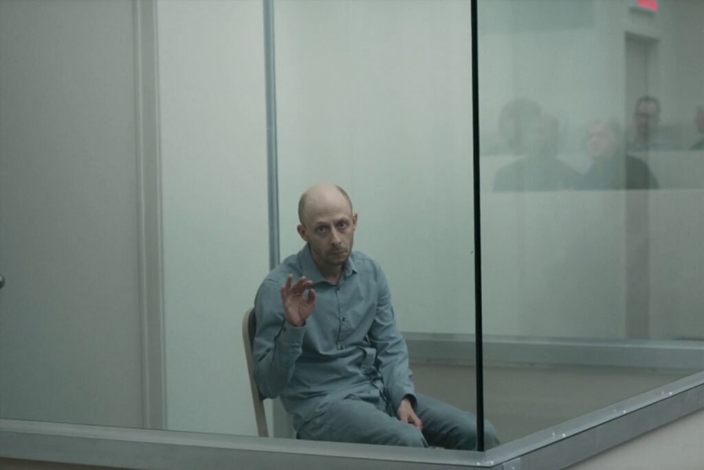 Screenshot from the movie Red Rooms (2023)