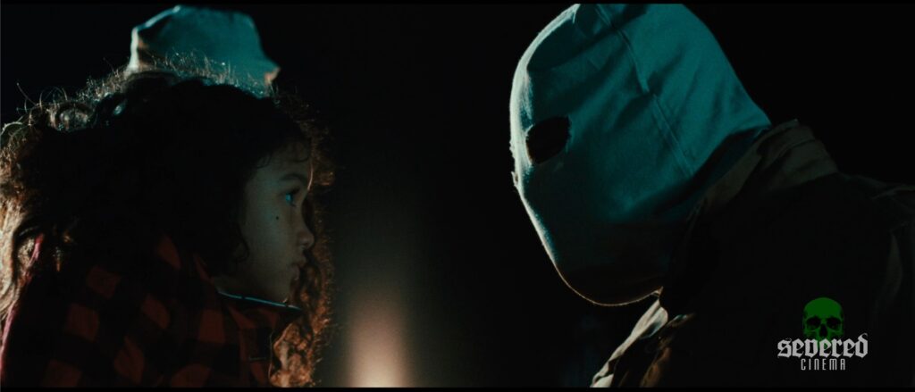 Screenshot from the movie The Rows shot on 33mm film