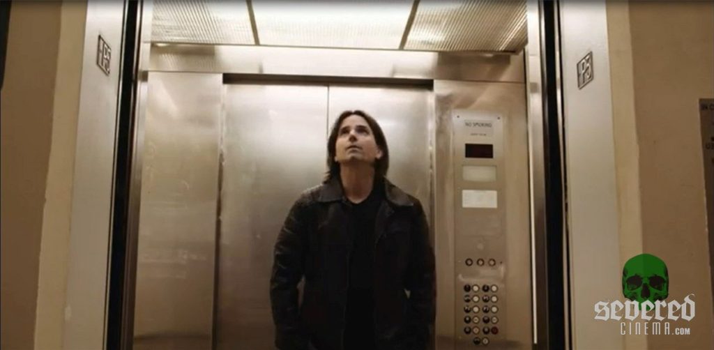 Shane Ryan standing in elevator